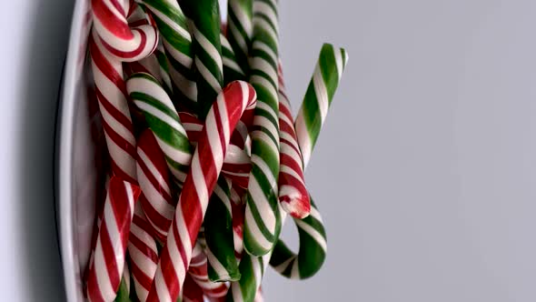 Vertical orientation video: Christmas candy cane caramels