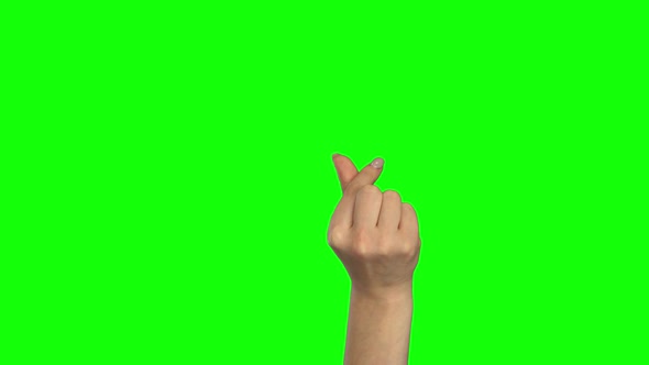 Hand of Girl Snapping Her Fingers. Chroma Key. Close Up