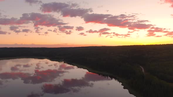 Peaceful Aerial View of Calm Water at Sunrise