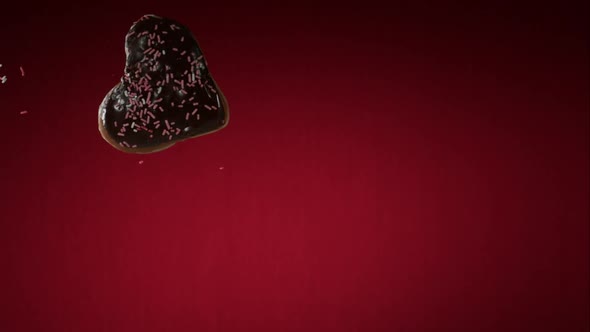 Doughnuts falling and bouncing in ultra slow mo 1500fps - reflective surface - DOUGHNUTS PHANTOM 