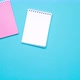 Stop motion of school stationery on blue background. - VideoHive Item for Sale