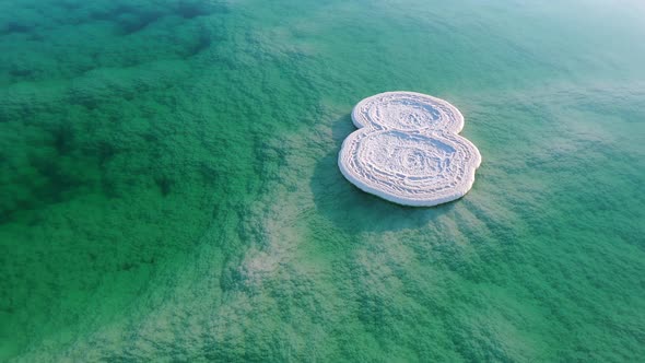 Aerial view of salt formation islands in the Dead Sea, Israel. 4K