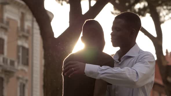 Black people greeting.African men's Handshake and hug- slow motion