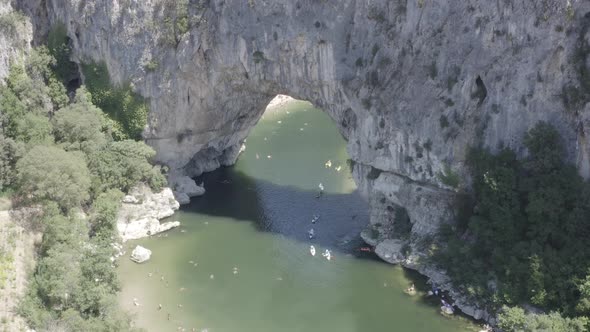 Ungraded Aerial view of Narural arch in Vallon Pont D'arc in Ardeche canyon in France