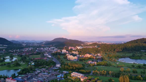 Aerial Drone view Sunset or sunrise mountain and road in kathu city Phuket thailand, Beautiful sunse