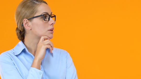 Pensive Business Woman Touching Chin, Thinking on New Project Development