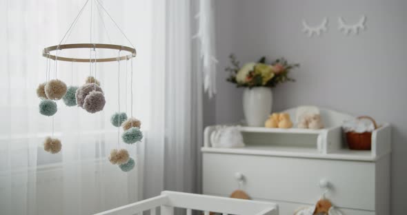 Handmade Baby Nursery Mobile Hanging Spinning Above Crib in Child Bedroom