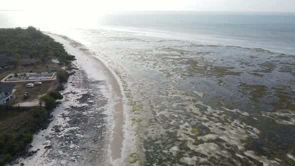 Shore of Zanzibar Island Tanzania at Low Tide Slow Motion