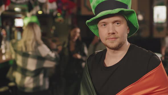 Man With Irish Flag At Party In Pub