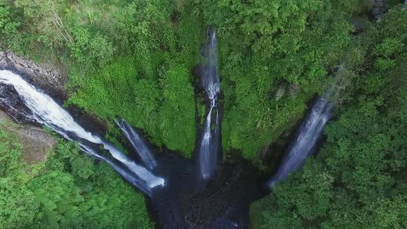 Aerial View of Waterfall in Green Rainforest