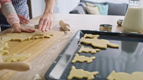 Close up video punching Easter cookies. Shot with RED helium camera in 8K.