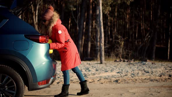 Traveler Transportation With Suitcase.Holiday Vacation Weekend In Winter.Female Leaves After Quarrel