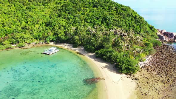 Daytime drone abstract view of a summer white paradise sand beach and blue sea background in best qu