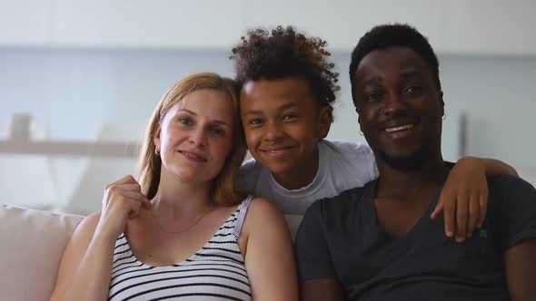 African Portrait of Cute Happy Interracial Family of Mother Father and Son