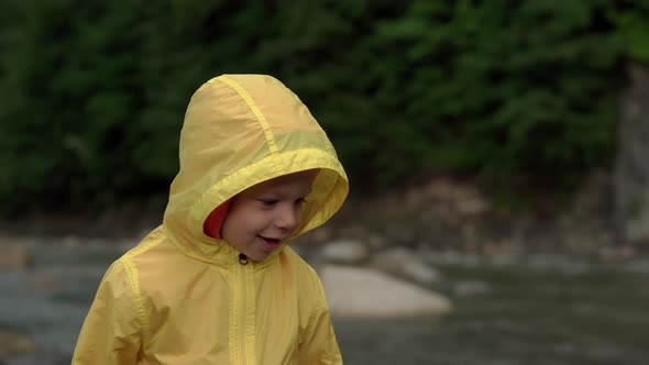 Little Preschool Children Near Mountain River