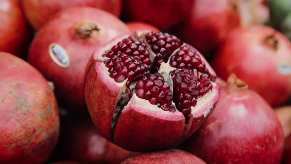 Ripe and juicy half of pomegranates ready for making juice in Tel Aviv, Israel