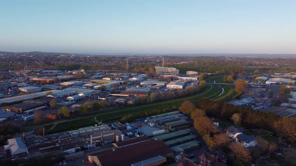 Orbit around Exeter Energy Recovery Facility during golden hour in Exeter, UK