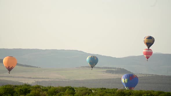 Beautiful Rocky Landscape of Crimea with Colorful Hotair Balloons Balloons Flying on Sunset HDR Time