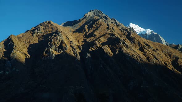 Shadow Uncovering Rocky Mountain In Nepal. Timelapse