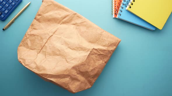 a Lunch Paper Packet on Color Background