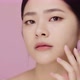 Close up face of young Asian woman worry about face skin problem on pink background. - VideoHive Item for Sale