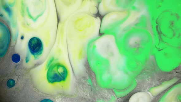 Colorful acrylic chemical reaction. Slow motion.