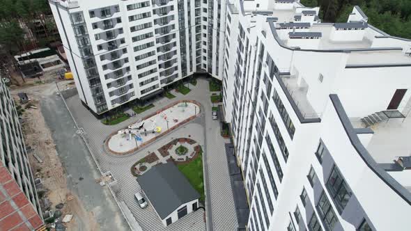 Aerial View of a Newly Modern MultiStorey Building in a Forest Area