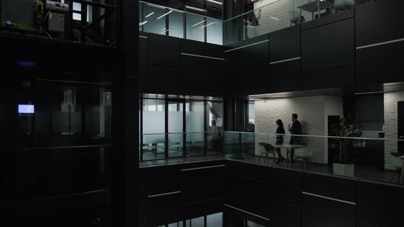 Silhouette of Businesspeople That are Walking Inside the Business Building