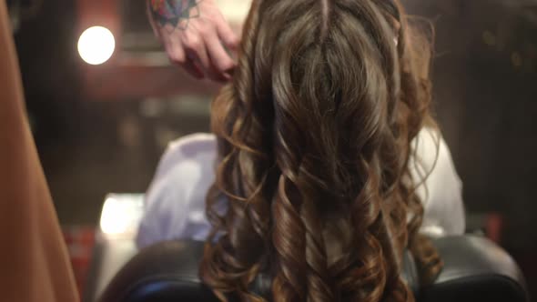 Back View Head of Brunette Woman with Fixation Spray Spraying in Slow Motion