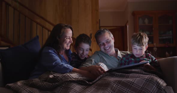 Family spending time together at home in the evening