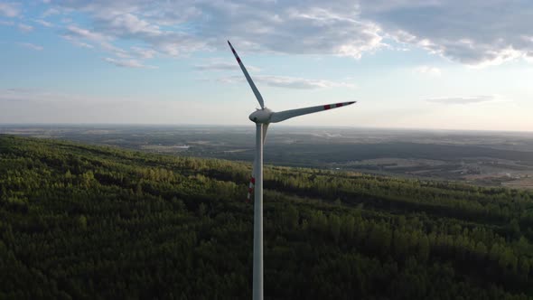 Wind Turbine on a Hill at Sunrise