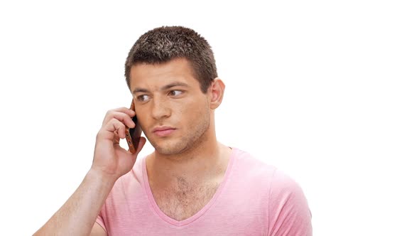 Young Handsome Man Talking on Phone Jittering Over White Background Slow Motion