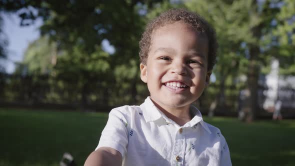 Portrait of a Cute African Boy in the Park