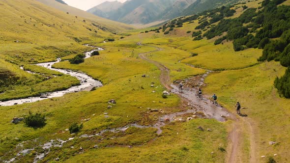 People Ride Bicycle at the Mountain Valley