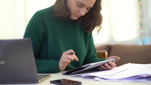 Young woman using digital tablet