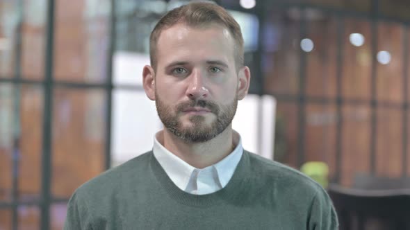 Portrait Shoot of Handsome Man Looking at Camera