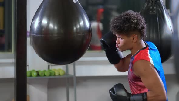 Preparing for Professional Boxing Competition Black Guy is Training Hand Punch