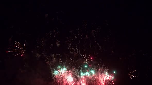 Colorful Firework display at night on sky background