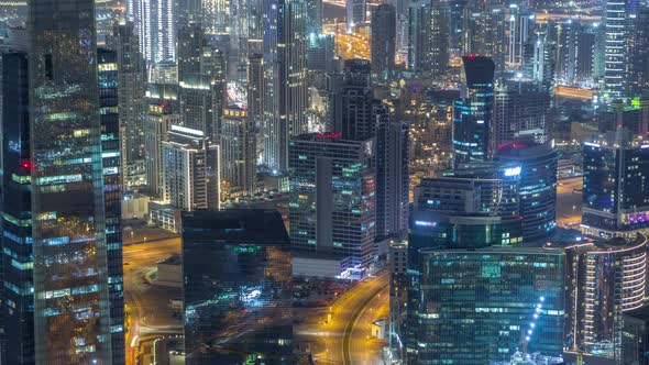 Panoramic Aerial View of Business Bay Towers in Dubai Night Timelapse