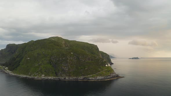 Hendanes Lighthouse ( Hendanes fyr) At Vagsoy Island In Kinn, Vestland County, Norway. - aerial