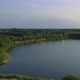 Countryside Dramatic and Colorful Sunset Flight Over a Forest Lake Aerial Shot on a Drone - VideoHive Item for Sale