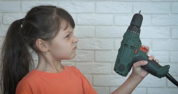 Child with Electric Drill