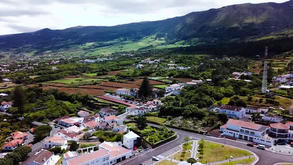 Landscape shot over São Roque do Pico  in Pico Island, flying towards the mountains. Azores Island,