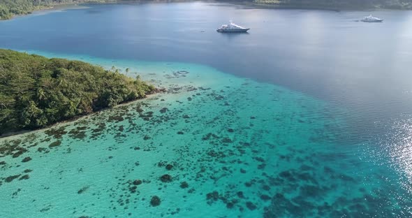 Island living views. Drone shot of water landscape in Tonga five