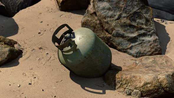 Old Cooking Gas Cylinder on Sand Beach