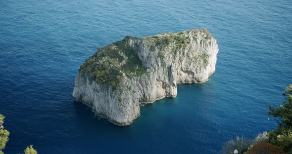 Top down view of the smallest of Capri's Faraglioni, the famous cliffs of this beautiful island