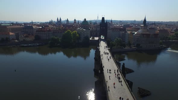 Aerial shot of people walking on Charles Bridge 