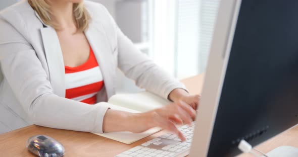 Businesswoman working on computer