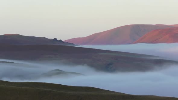 Early morning cloud inversion looking over the upper Eden Valley in Cumbria, with small white vaning