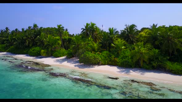 Aerial drone shot landscape of tropical coast beach journey by transparent ocean with white sandy ba